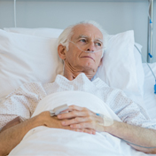 old man in hospital bed.jpg